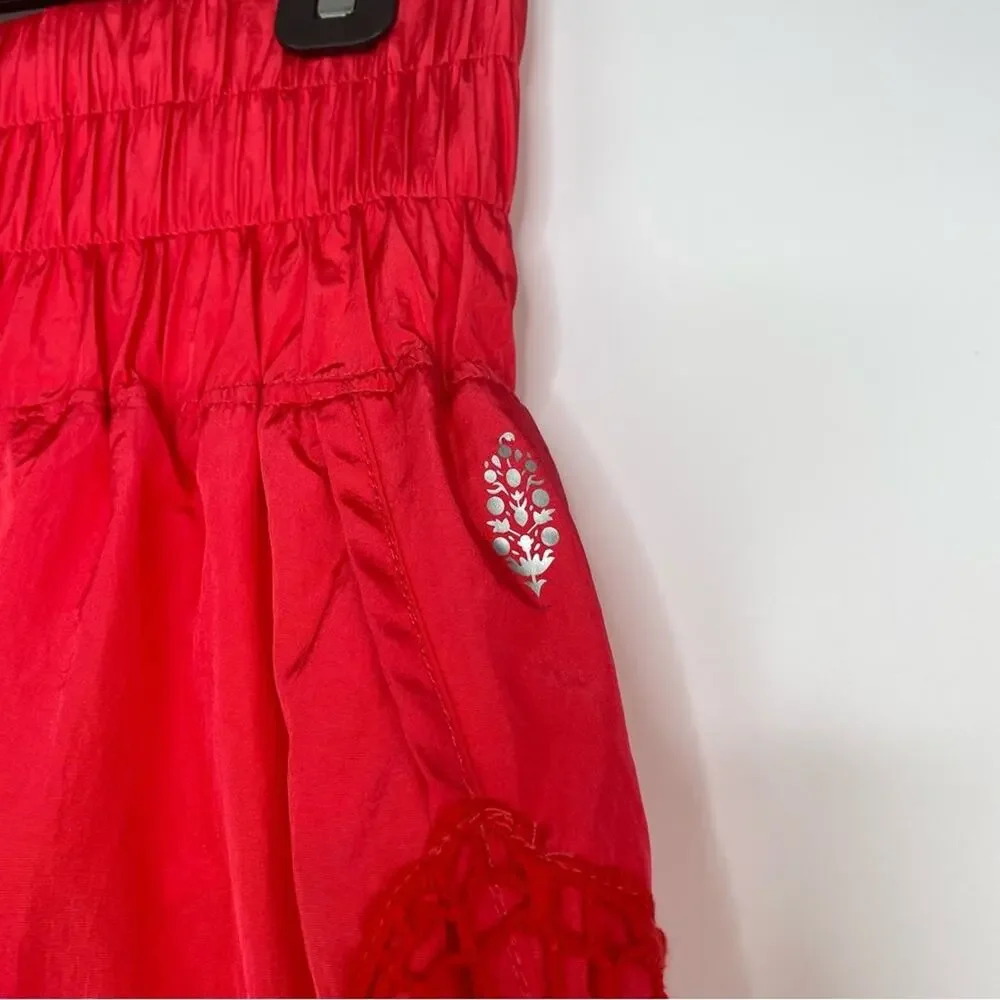FP Movement Free People neon orange high waisted shorts size Medium